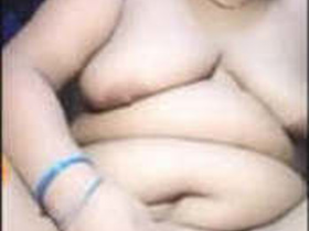 Indian auntie's intimate phone sex show in HD video