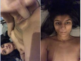 A horny girl with a huge black dildo