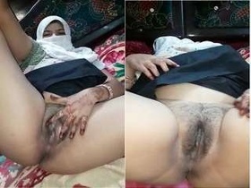 A seductive woman flaunts her private parts in a tantalizing display