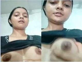 Adorable webcam girl flaunts her perky breasts