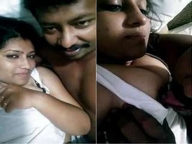 Tamil wife gives husband a breastjob in video