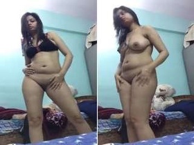 Desi Indian girl's seductive striptease for pay