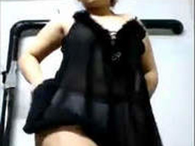 A pretty girl pleasures herself in this solo video