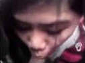 Indian girl gives a blowjob in the car