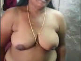 Tamil auntie stripping down to her lingerie