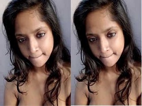 Ria, a paid Indian call girl, strips naked for the camera