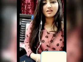 Indian girlfriend flaunts her breasts in online video