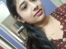Indian woman pleasures herself with her hands in the bathroom