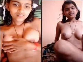 Attractive Indian woman flaunts her breasts and genitalia in explicit video