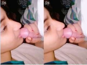 Indian girl giving head to boyfriend in bedroom