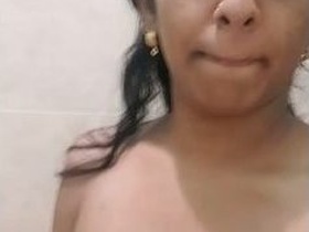 Watch a stunning Indian girl flaunt her breasts and vagina