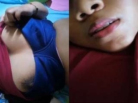 Attractive girl flaunts her breasts on camera