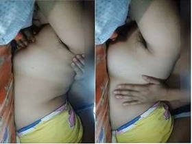 Husband fondles Desi Boudi's breasts in steamy video