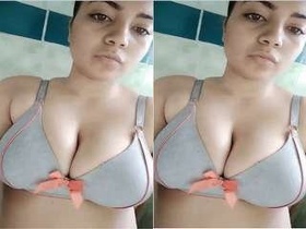 A stunning girl films herself exposing her buttocks and vagina