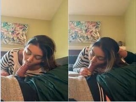 Girl with a hot stare gives an NRI blowjob