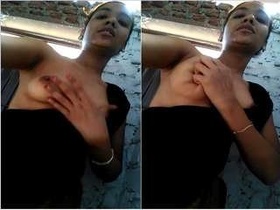 A sweet video of a young Desi girl proudly exposing her breasts