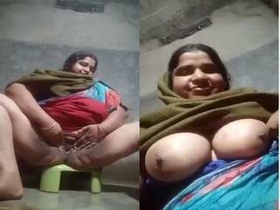 Boudi reveals her breasts and pussy in exclusive video
