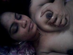 Big-breasted Indian secretary takes nude selfies and fondles herself at work
