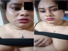 Exclusive video of a horny Desi bhabhi flaunting her breasts