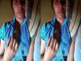 Exclusive video of a cute Indian girl pressing her breasts