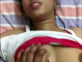 Pakistani girl gives a nice blowjob and plays with her lover's breasts