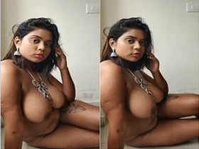 Busty model flaunts her ample bosom