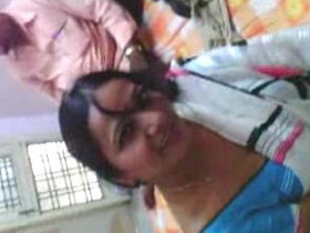 Aunt poses in front of husband's friend in amateur video