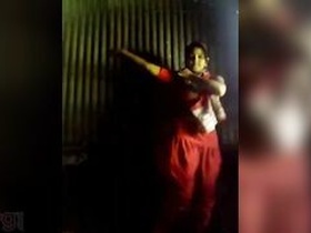 Bangladeshi beauty slowly dressing in a Desi sari