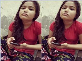 Cute Indian girl takes a bath in the tub
