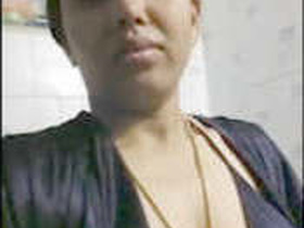 Desi bhabhi in black lingerie gets naughty in the bathroom