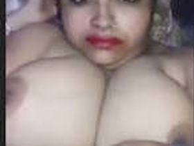 Indian wife shows off her big tits in hot video