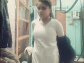 College girl chatting in Hindi with her boyfriend while undressing