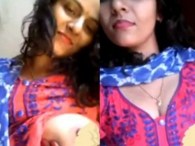 Beautiful Indian bhabhi flaunts her large breasts in a seductive manner
