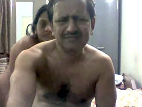 Hot aunty and husband's friend get frisky in this video