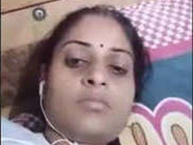 Indian bhabi gets turned on by pressing her breasts during video call