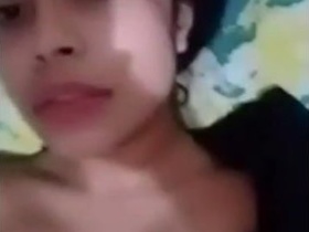 Horny teen fingering herself in solo video
