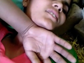 Young black girl experiences pain in outdoor setting