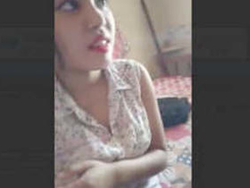 A stunning girl revealing her breasts and pleasuring her math tutor with a handjob