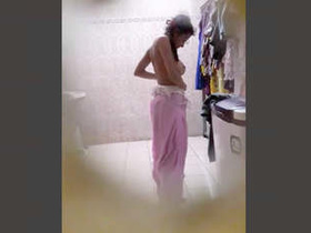 Desi teen spies on girlfriend in bathroom