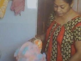Mature aunty indulges in a relaxing bathing session