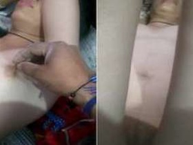 Indian girl sleeps but man films her pinky flower