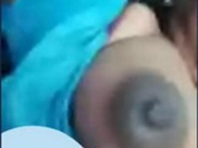 Aunty flaunts her large breasts on a selfie camera