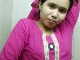 Cute desi bhabi shows off her sexy body and opens up her dress