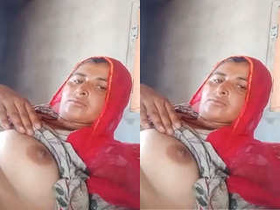 Busty Indian village girl flaunts her assets in a steamy video
