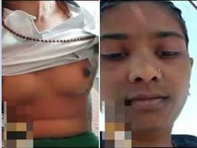 Exclusive video of a cute Indian girl exposing her tits and pussy
