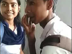 Desi college student kissing and snuggling in bed