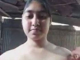 Indian girl with big tits goes nude and takes a selfie