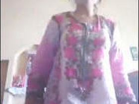 Pakistani babe strips down to her underwear in front of her lover