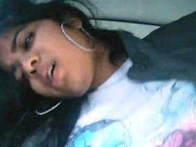 Desi couple rides car in parking lot