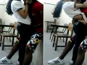 Desi couple enjoys standing fingering in classroom